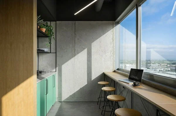 Snack and coffee area at BySpaces Coworking, Seville